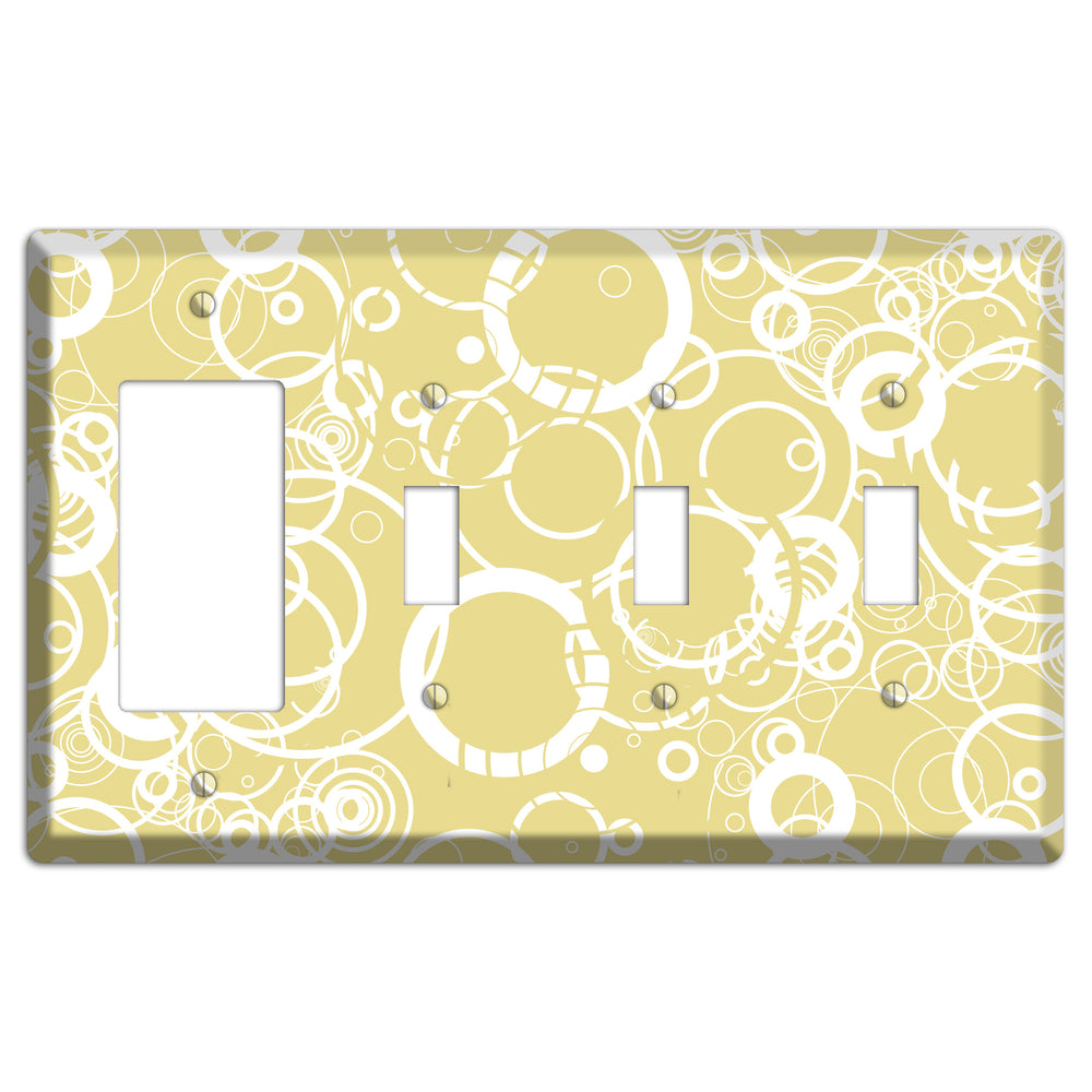 Beige with White Rings Rocker / 3 Toggle Wallplate
